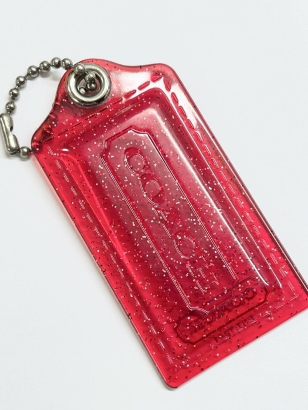 Coach Red Clear with Silver Glitter Hang Tag 3 1/2 inches wide EUC